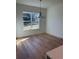 Dining room filled with hardwood floors and natural light at 6125 Village Edge Pl, Sanford, FL 32771