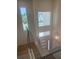 Entryway with a view of the high-ceiling entryway with chandelier lighting and designer walls at 6125 Village Edge Pl, Sanford, FL 32771