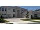 Stunning two-story home featuring a brick driveway, a symmetrical facade, and a two-car garage at 6125 Village Edge Pl, Sanford, FL 32771