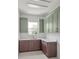 Laundry room featuring ample cabinet space, granite countertops, and a sink at 6125 Village Edge Pl, Sanford, FL 32771