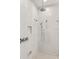 Modern shower features a rain shower head, handheld sprayer, and built-in niche at 6125 Village Edge Pl, Sanford, FL 32771