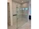 Contemporary shower with glass enclosure, offering sleek design and a luxurious bathing experience at 6125 Village Edge Pl, Sanford, FL 32771