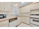 Detailed view of kitchen area with standard appliances and lots of storage at 750 Polo Park Blvd, Davenport, FL 33897