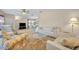 Bright living room with carpeted floors and an open layout at 750 Polo Park Blvd, Davenport, FL 33897