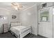 Cozy bedroom featuring a single bed, neutral decor, and ample natural light at 793 Greenway Pl, Daytona Beach, FL 32114