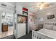 Charming bedroom featuring a single bed, wardrobe storage, and a bright, airy ambiance at 793 Greenway Pl, Daytona Beach, FL 32114