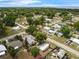 A peaceful neighborhood surrounded by mature trees and lush greenery at 803 Jersey Ave, St Cloud, FL 34769