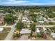 Aerial view of a charming neighborhood with tree-lined streets and well-maintained homes at 803 Jersey Ave, St Cloud, FL 34769