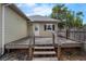 Backyard featuring a deck and stairs perfect for outdoor entertaining at 803 Jersey Ave, St Cloud, FL 34769