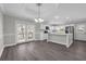 Bright kitchen and dining area with white cabinets, stainless steel appliances and patio access at 803 Jersey Ave, St Cloud, FL 34769