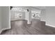Spacious living room featuring an open layout, modern flooring, and plenty of natural light at 803 Jersey Ave, St Cloud, FL 34769