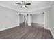 Spacious living room featuring an open layout, modern flooring, and neutral paint for a bright, airy feel at 803 Jersey Ave, St Cloud, FL 34769