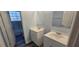 Bathroom features a double vanity, tile walls, and updated fixtures at 8612 Valley Ridge Ct, Orlando, FL 32818