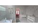 Bathroom featuring a bath, shower, and & double sink at 8612 Valley Ridge Ct, Orlando, FL 32818