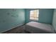 Well-lit bedroom features unique elephant decals on the wall, complemented by wood-look floors at 8612 Valley Ridge Ct, Orlando, FL 32818