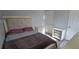 Bedroom with wood floors, a dresser, and a bed at 8612 Valley Ridge Ct, Orlando, FL 32818