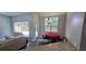 Open floor plan featuring a dining area with a round table and contemporary chandelier at 8612 Valley Ridge Ct, Orlando, FL 32818