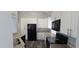 Modern kitchen features granite countertops, stainless steel appliances, and ample counter space at 8612 Valley Ridge Ct, Orlando, FL 32818