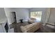 Bright living room with wood floors, neutral walls, and large windows for natural light at 8612 Valley Ridge Ct, Orlando, FL 32818