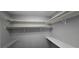 Organized walk-in closet with ample shelving and storage at 8612 Valley Ridge Ct, Orlando, FL 32818