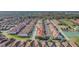 Scenic aerial view highlights community amenities, lush greenery, and proximity to local attractions at 8919 Bismarck Palm Rd, Kissimmee, FL 34747