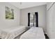 Bedroom featuring two beds, window and ceiling fan at 8919 Bismarck Palm Rd, Kissimmee, FL 34747