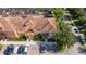 Well-maintained townhome exterior showcasing landscaping, dedicated parking, and inviting curb appeal at 8919 Bismarck Palm Rd, Kissimmee, FL 34747