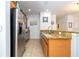This bright kitchen has stainless steel appliances and granite countertops at 8919 Bismarck Palm Rd, Kissimmee, FL 34747