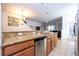 Kitchen showcasing granite countertops, and stainless steel dishwasher at 8919 Bismarck Palm Rd, Kissimmee, FL 34747