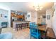 Bright living space featuring a modern kitchen, dining area and living room at 8919 Bismarck Palm Rd, Kissimmee, FL 34747