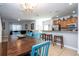 Open floor plan living space featuring dining room, kitchen and living room at 8919 Bismarck Palm Rd, Kissimmee, FL 34747