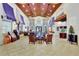 This grand lobby is a warm, welcome place to enter with an amazing wood ceiling at 8919 Bismarck Palm Rd, Kissimmee, FL 34747