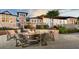 Outdoor fire pit with Adirondack chairs, creating a cozy gathering space for residents and guests at 8940 Coconut Breeze Dr, Kissimmee, FL 34747