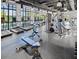A spacious gym featuring new equipment and abundant natural light, offering a state-of-the-art fitness experience for residents at 8940 Coconut Breeze Dr, Kissimmee, FL 34747