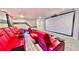 Private home theater featuring tiered seating, premium recliners, and a large screen for ultimate entertainment at 8940 Coconut Breeze Dr, Kissimmee, FL 34747