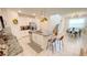 Modern kitchen features a center island with seating and stainless steel appliances at 8940 Coconut Breeze Dr, Kissimmee, FL 34747