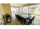 This spacious screened in lanai features outdoor dining with a gas grill, offering a great space for entertaining and relaxing at 8940 Coconut Breeze Dr, Kissimmee, FL 34747
