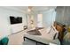 Serene main bedroom with a plush bed, designer wallpaper, and an en-suite bathroom and walk-in closet at 8940 Coconut Breeze Dr, Kissimmee, FL 34747