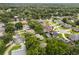 Aerial view showcasing the neighborhood's lush canopy, well-maintained homes, and mature trees at 926 Ridgeland Ct, Apopka, FL 32712