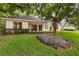 Beautiful backyard featuring green grass and mature shade trees at 926 Ridgeland Ct, Apopka, FL 32712