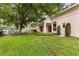Well-maintained backyard with mature trees and lush landscaping at 926 Ridgeland Ct, Apopka, FL 32712
