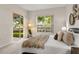Cozy bedroom with neutral tones, plenty of natural light, and access to the backyard patio at 926 Ridgeland Ct, Apopka, FL 32712