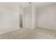 Neutral bedroom with neutral carpet and a closet at 926 Ridgeland Ct, Apopka, FL 32712