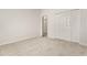 Neutral bedroom with neutral carpet and a closet at 926 Ridgeland Ct, Apopka, FL 32712