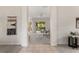 Inviting living room with neutral decor, a ceiling fan, and large windows overlooking the backyard at 926 Ridgeland Ct, Apopka, FL 32712