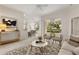 Open-concept living room offering backyard views, comfortable seating, and easy access to the kitchen at 926 Ridgeland Ct, Apopka, FL 32712