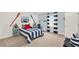 Nautical themed bedroom with striped bedding, white paneling, and light carpet at 11057 Hollow Bay Dr, Winter Garden, FL 34787