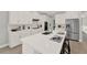 Modern kitchen with stainless appliances, granite countertops, and subway tile backsplash at 11057 Hollow Bay Dr, Winter Garden, FL 34787
