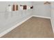 Spacious walk-in closet with wire shelving and wood-look tile flooring at 11057 Hollow Bay Dr, Winter Garden, FL 34787
