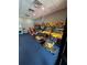 Amusement center features many arcade games in a carpeted room at 12527 Floridays Resort Dr # 506-E, Orlando, FL 32821